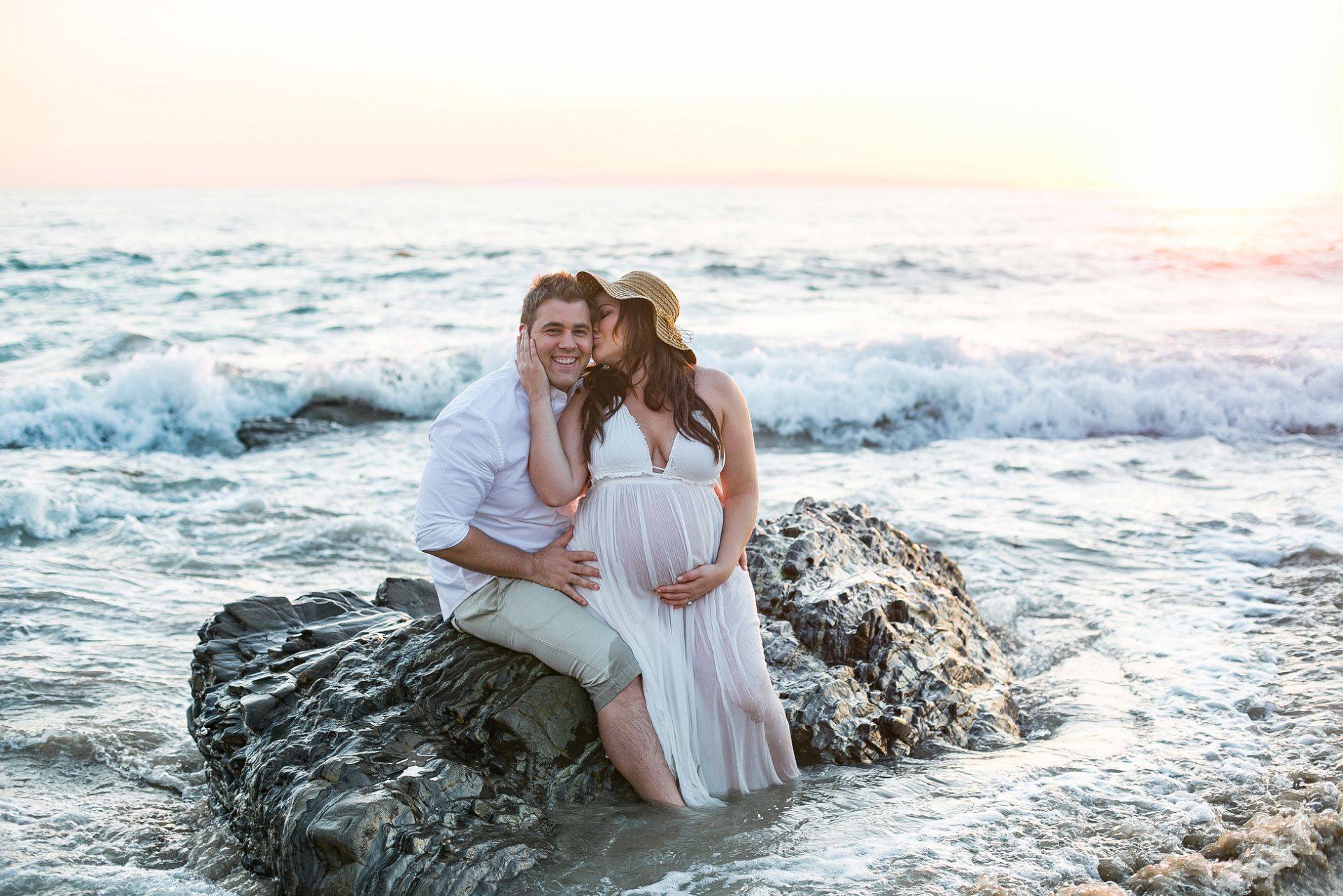 Kevin and Sno's beachside maternity session in Laguna Beach California. Photos by Poppy & Hive Photography.