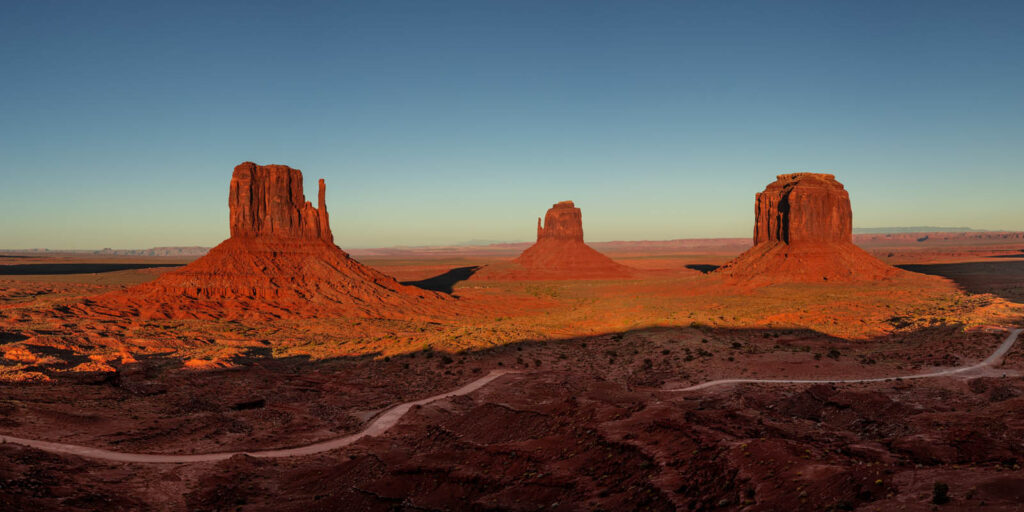 The iconic buttes and mesas of Monument Valley, a Navajo Nation Park, offer a dramatic and culturally rich setting for a Utah elopement.