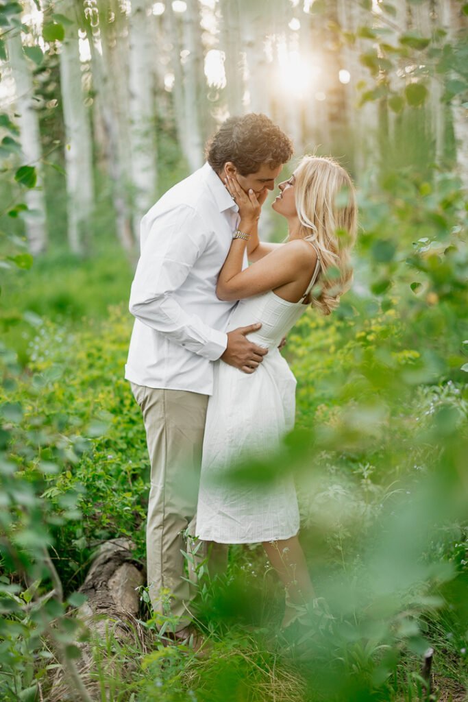 Kaitlyn and David celebrate their upcoming wedding with a sunset engagement photo shoot in Park City Utah with photographer Poppy & Hive Photography