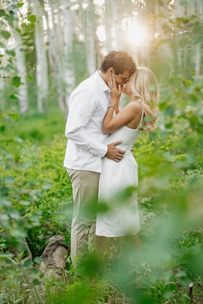 Kaitlyn and David celebrate their upcoming wedding with a sunset engagement photo shoot in Park City Utah with photographer Poppy & Hive Photography