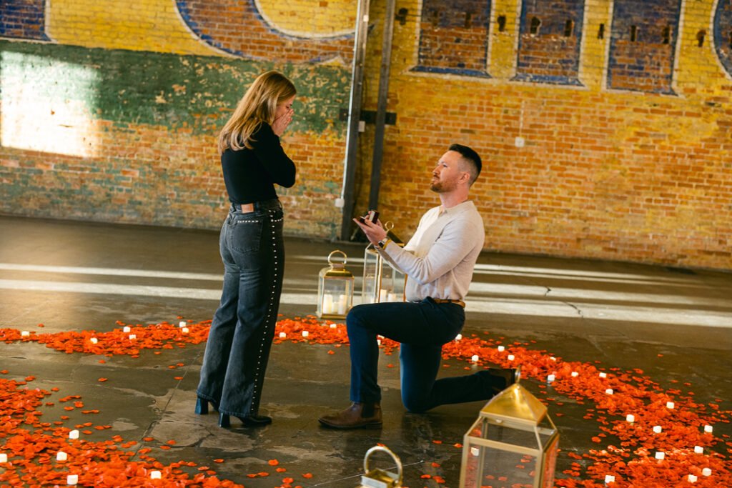 Ogden Utah surprise wedding proposal photographed by Poppy & Hive Photography. Surprise proposal at the Copper Nickel in Ogden.