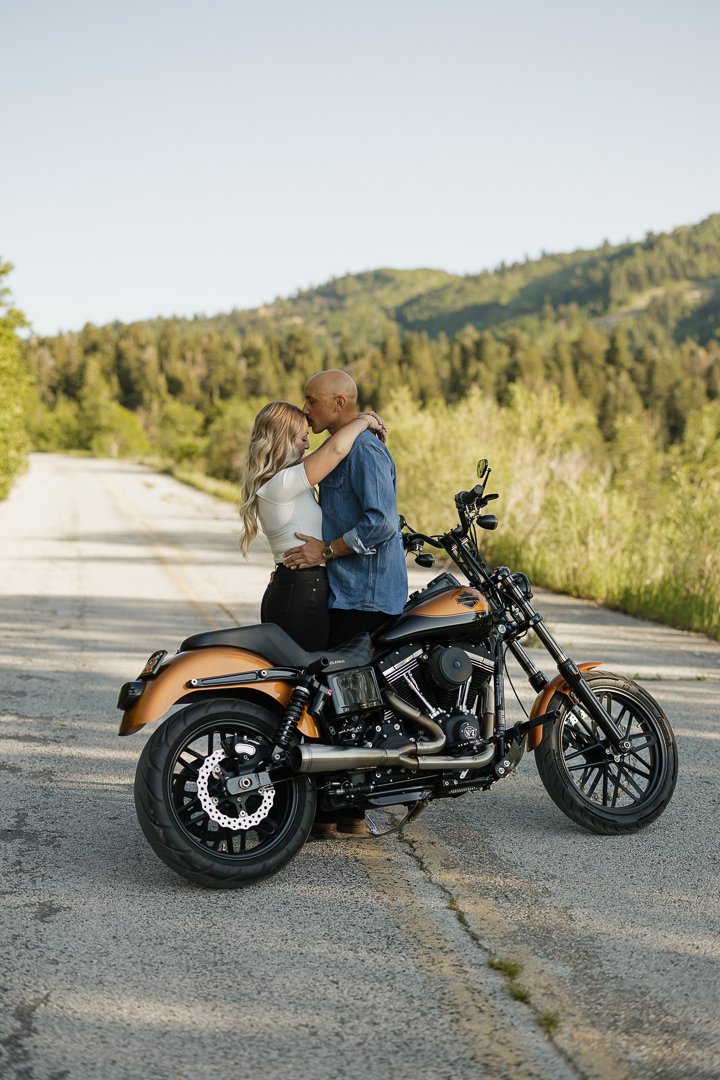 Motorcycle-themed engagement shoot with Poppy & Hive Photography. Engagement session on Old Snowbasin Road near Snowbasin Resort in Utah.