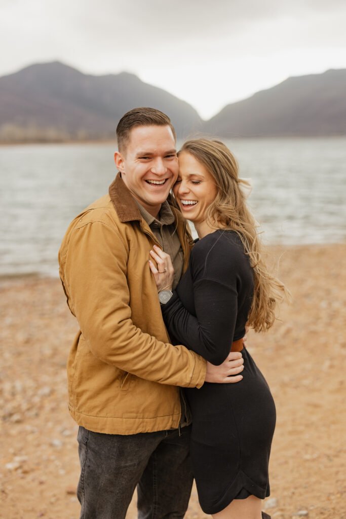 A romantic winter surprise proposal at Pineview Reservoir in Eden and Huntsville, Utah, captured by Poppy & Hive Photography in the Ogden Valley.