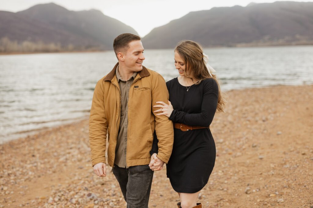 A romantic winter surprise proposal at Pineview Reservoir in Eden and Huntsville, Utah, captured by Poppy & Hive Photography in the Ogden Valley.